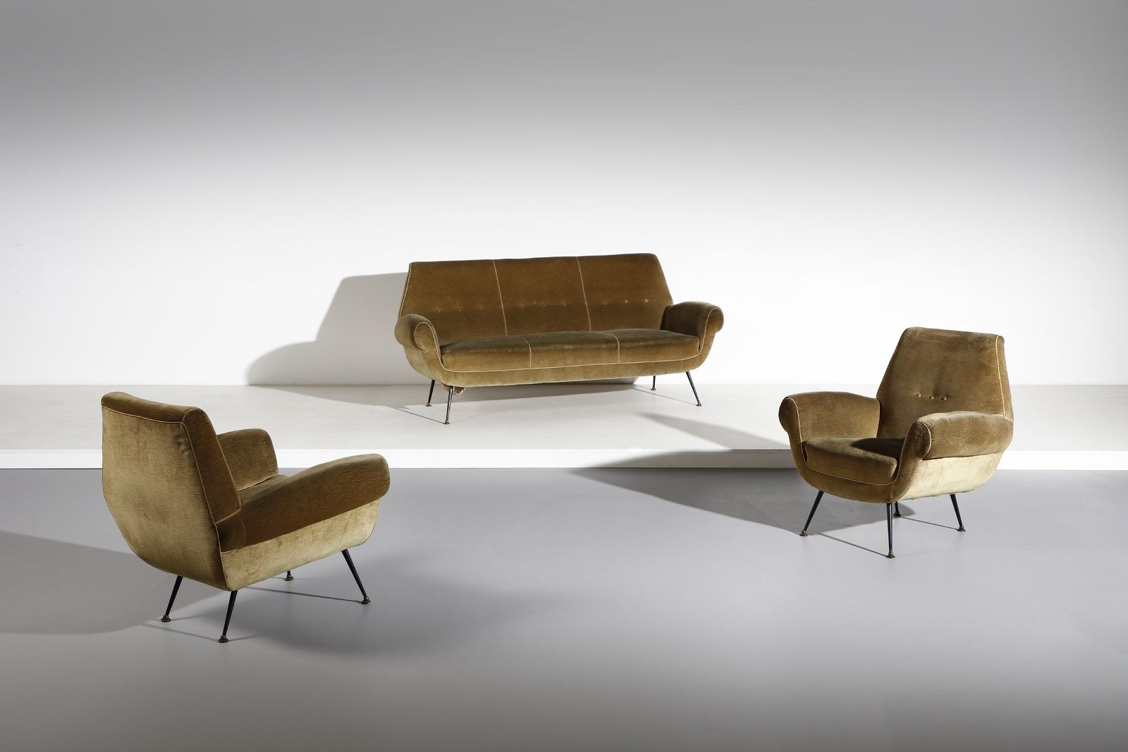 RADICE GIGI (1954 - 2002) Pair of armchairs and sofa for Minotti. Metal and padd&hellip;