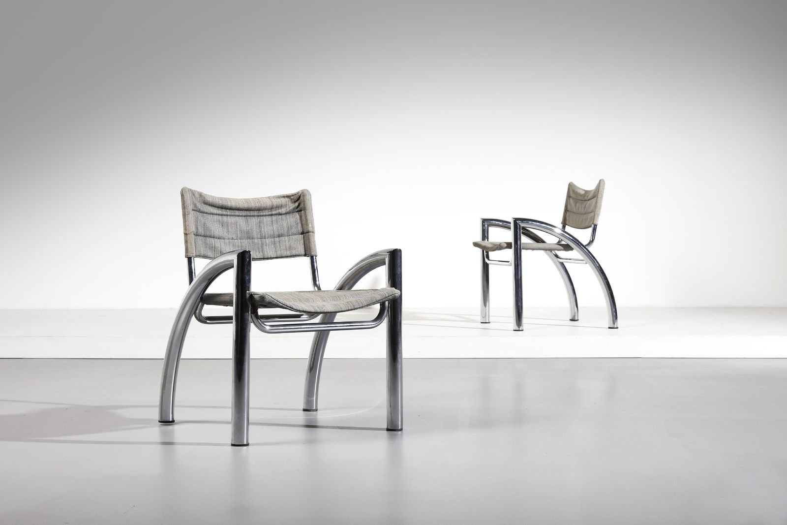AULENTI GAE (1927 - 2012) Pair of armchairs, Elam production. 1980. Chromed meta&hellip;