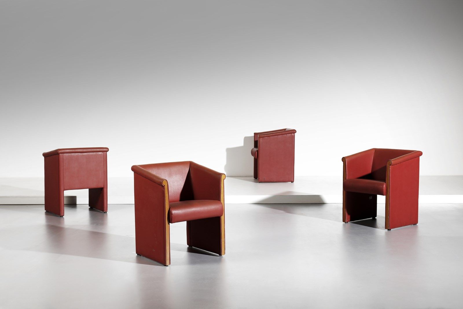 MOLTENI Four armchairs. Wood and leather.. Cm 74,00 x 75,00 x 54,00. 1980s.