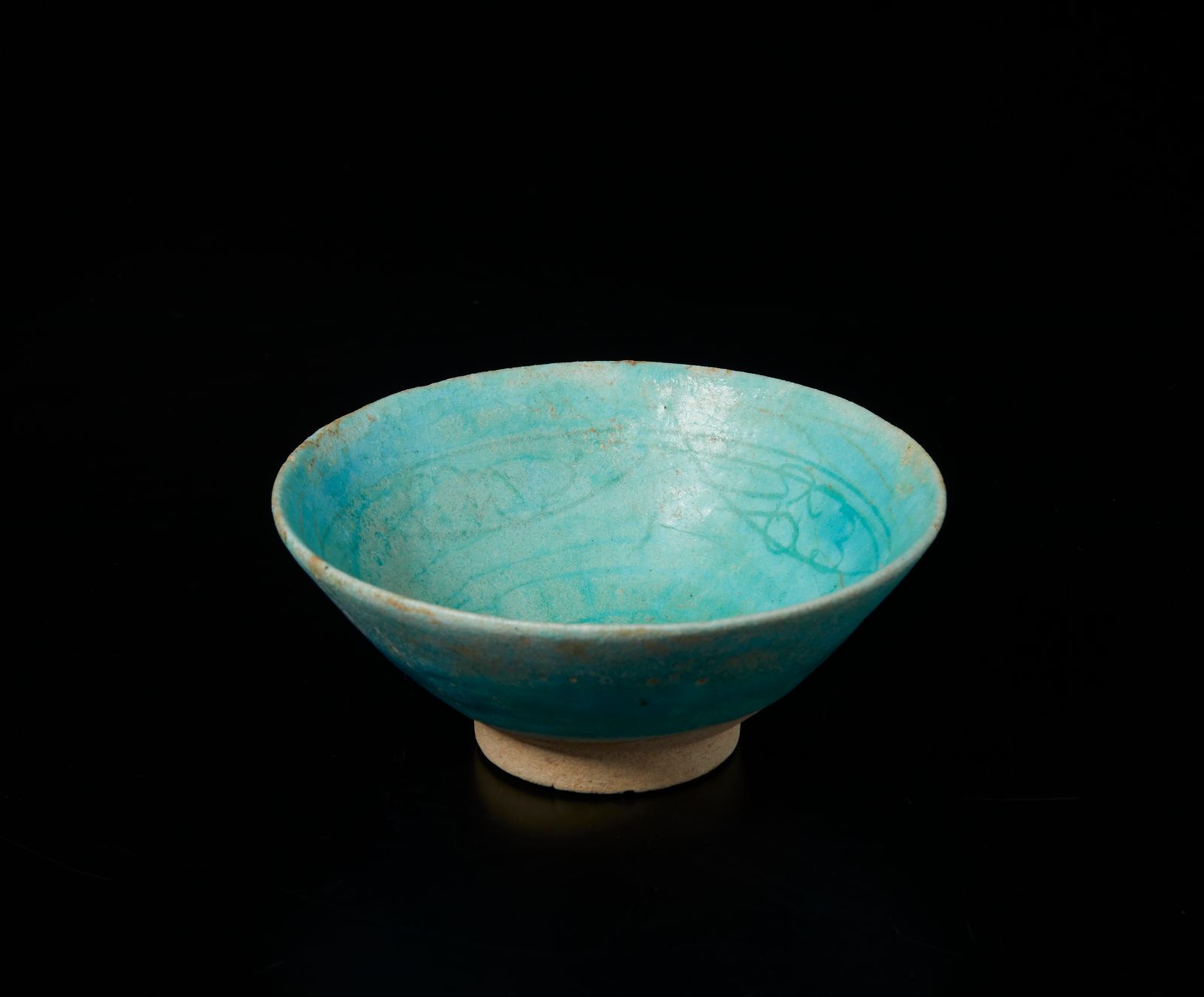 Islamic Art A monochrome turquoise glazed fritware bowl Art islamique. Bol en cé&hellip;