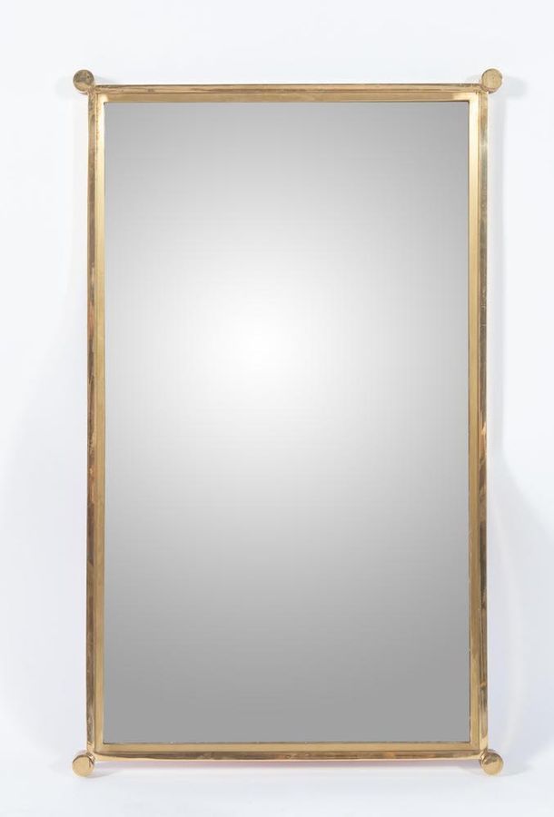 Null Brass and glass mirror. Made in Italy, c.1970. Cm 80x48x2,5.