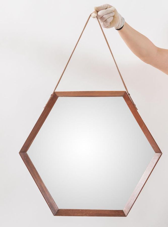 Null Hexagonal teak mirror. Made in Italy, c. 1960. Cm 47,5x47,5x3,5.