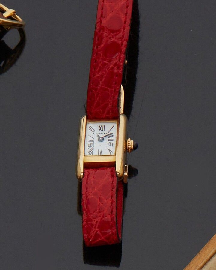 Null Cartier. Bracelet-montre de femme en or jaune 18K (750 millièmes) Cadran re&hellip;