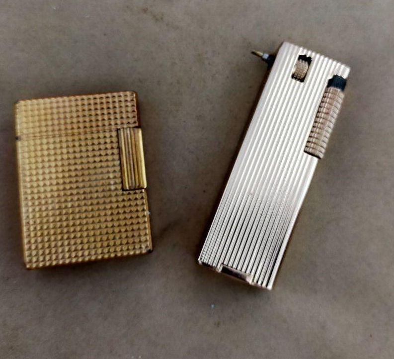 Null Two gold metal lighters