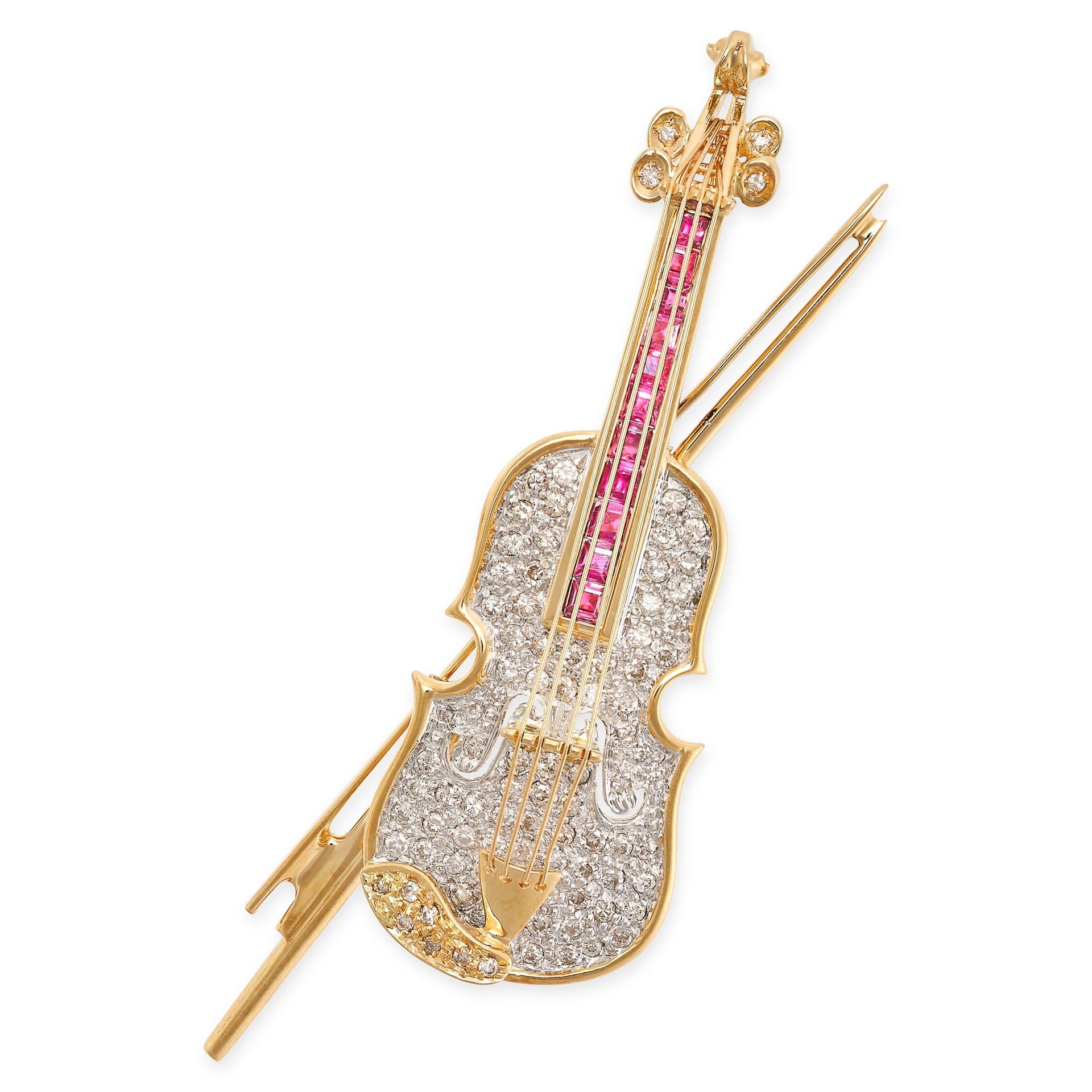 Null A DIAMOND AND RUBY VIOLIN AND BOW BROOCH in 18ct yellow gold, designed to d&hellip;