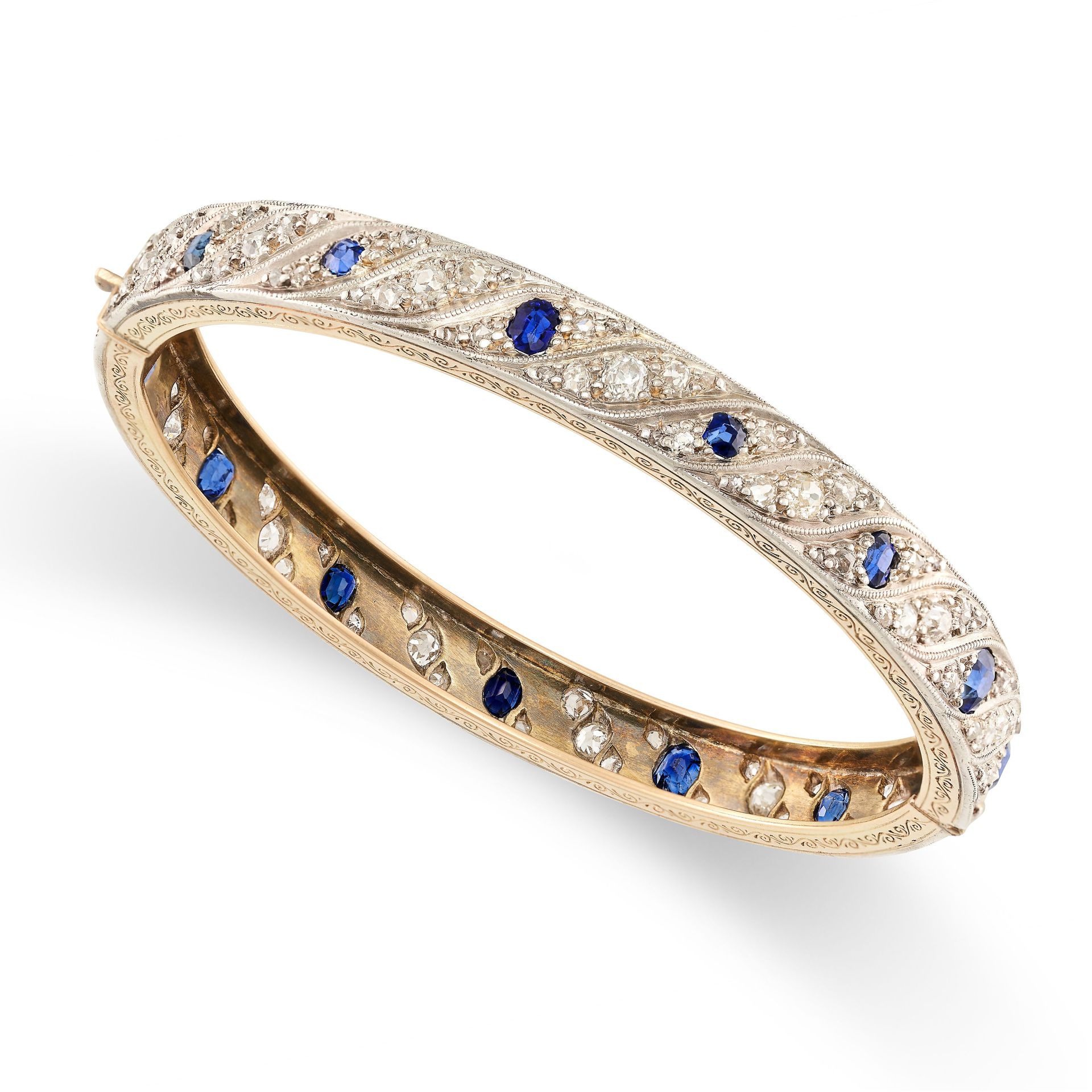 Null AN ANTIQUE SAPPHIRE AND DIAMOND BANGLE in yellow and white gold, set with c&hellip;
