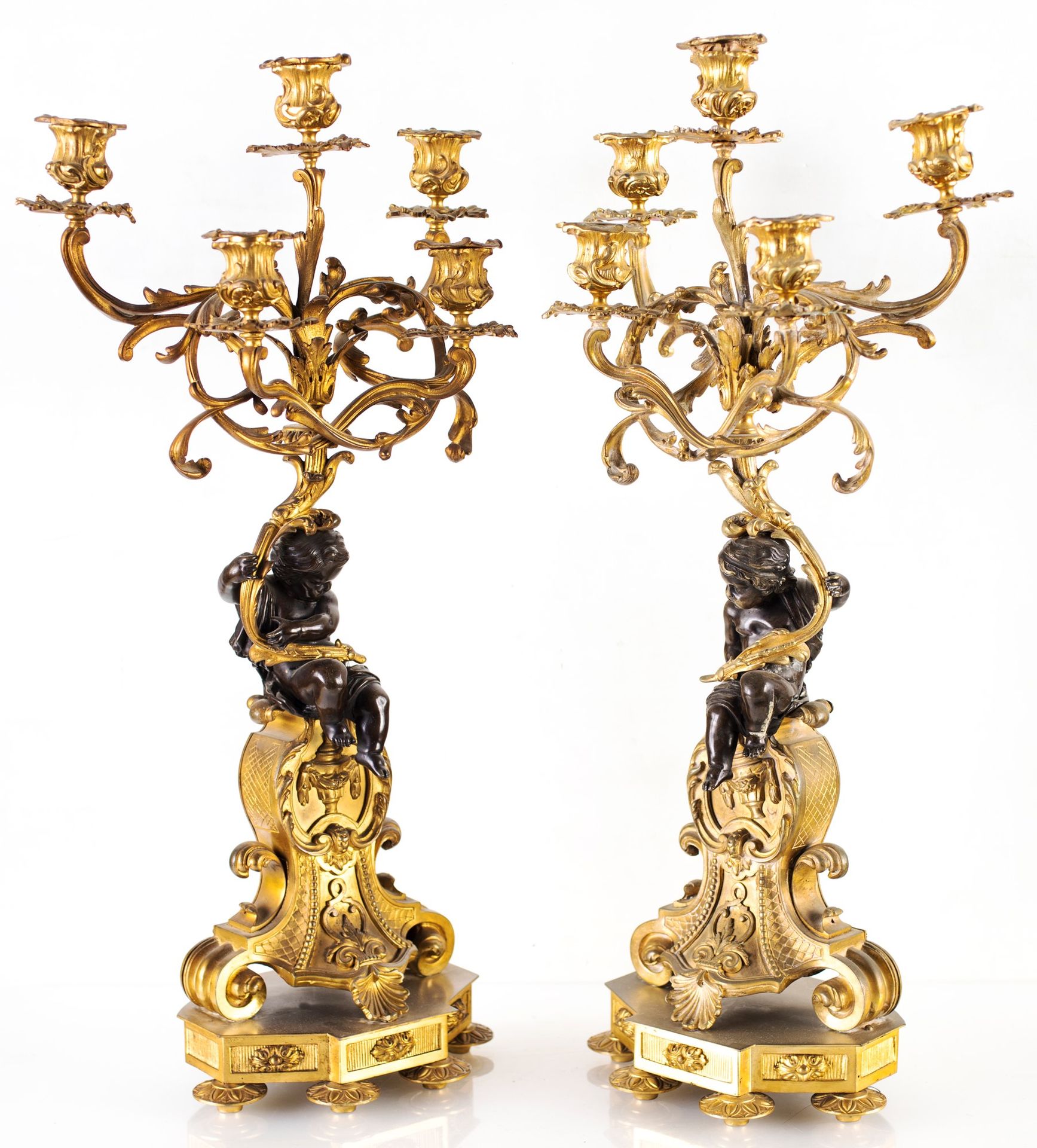Pair of gilt bronze candelabra, 19th century with five arms supported by burnish&hellip;
