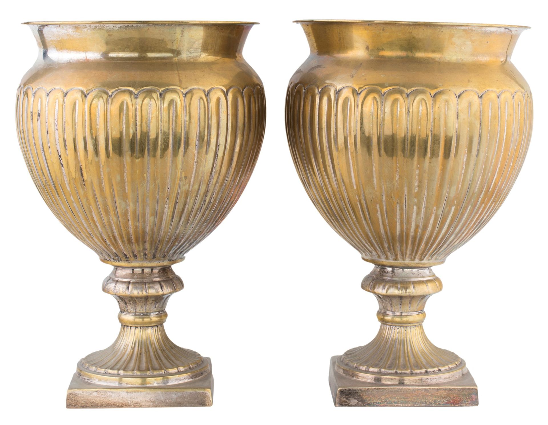 Pair of vases (possibly silver) cup-shaped on a spool foot