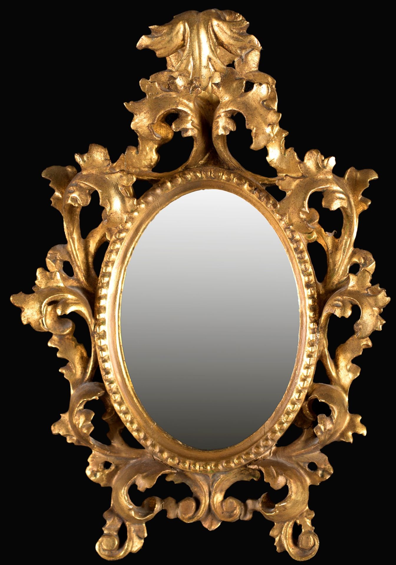 Mirror in gilded wood, Tuscany, 19th century with an oval frame enclosed by bead&hellip;