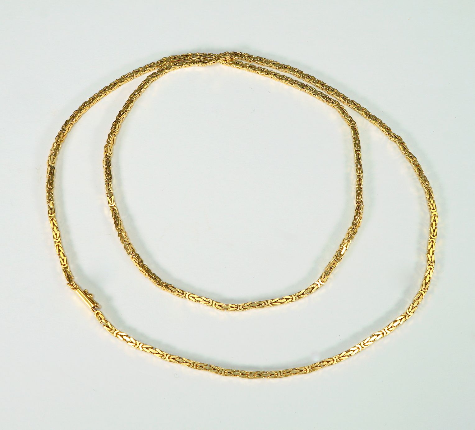 Zeitlose Königskette 18K黄金，印有珠宝商的标记。国王图案的链条如新，有安全扣。长约80厘米，重约45克