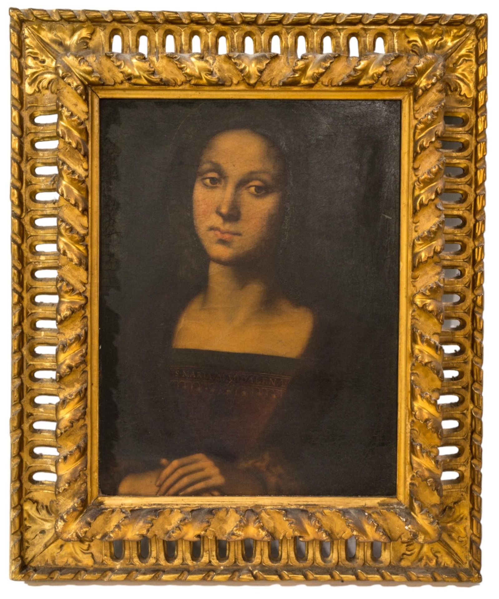 Null 佩鲁吉诺之后，一幅画在帆布上的玛利亚-玛格达莱纳肖像油画，画中的玛利亚忏悔安息，装在穿孔叶片装饰的镀金木框中
45 x 34 厘米
