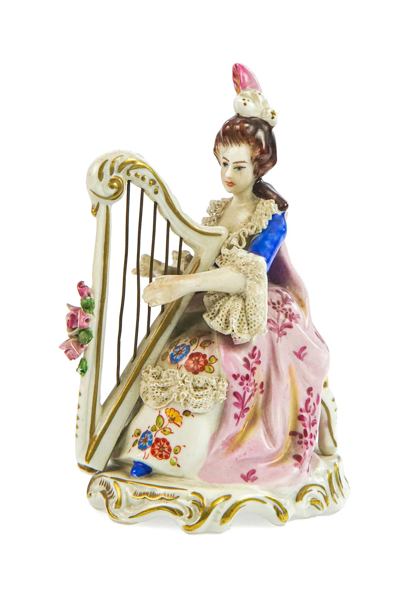Null 描绘一位女士演奏竖琴的雕像

多彩瓷器，Capodimonte型制造

h 12,5 cm