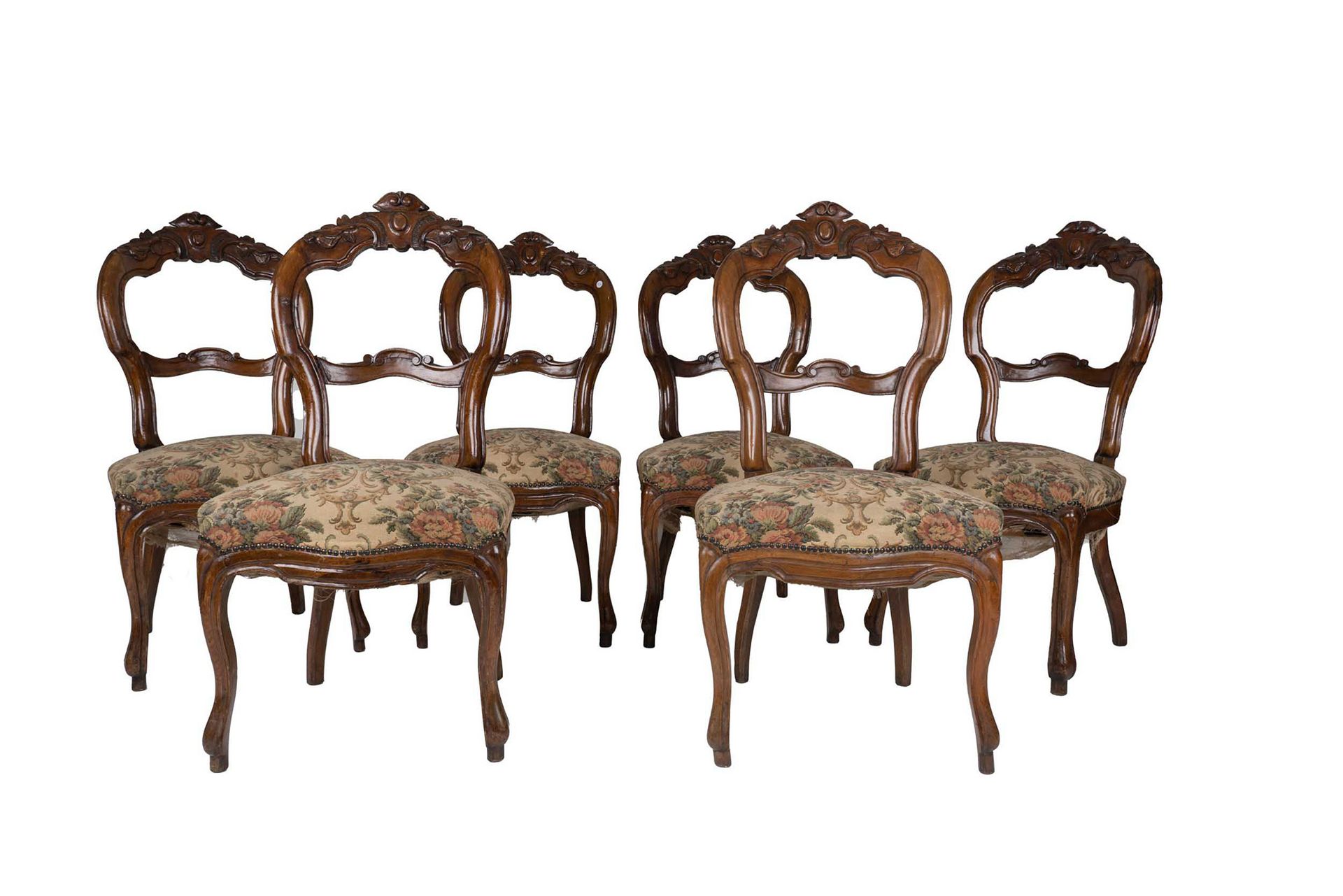 Null Six chairs 

mid-19th century 

carved walnut, shaped back decorated with p&hellip;