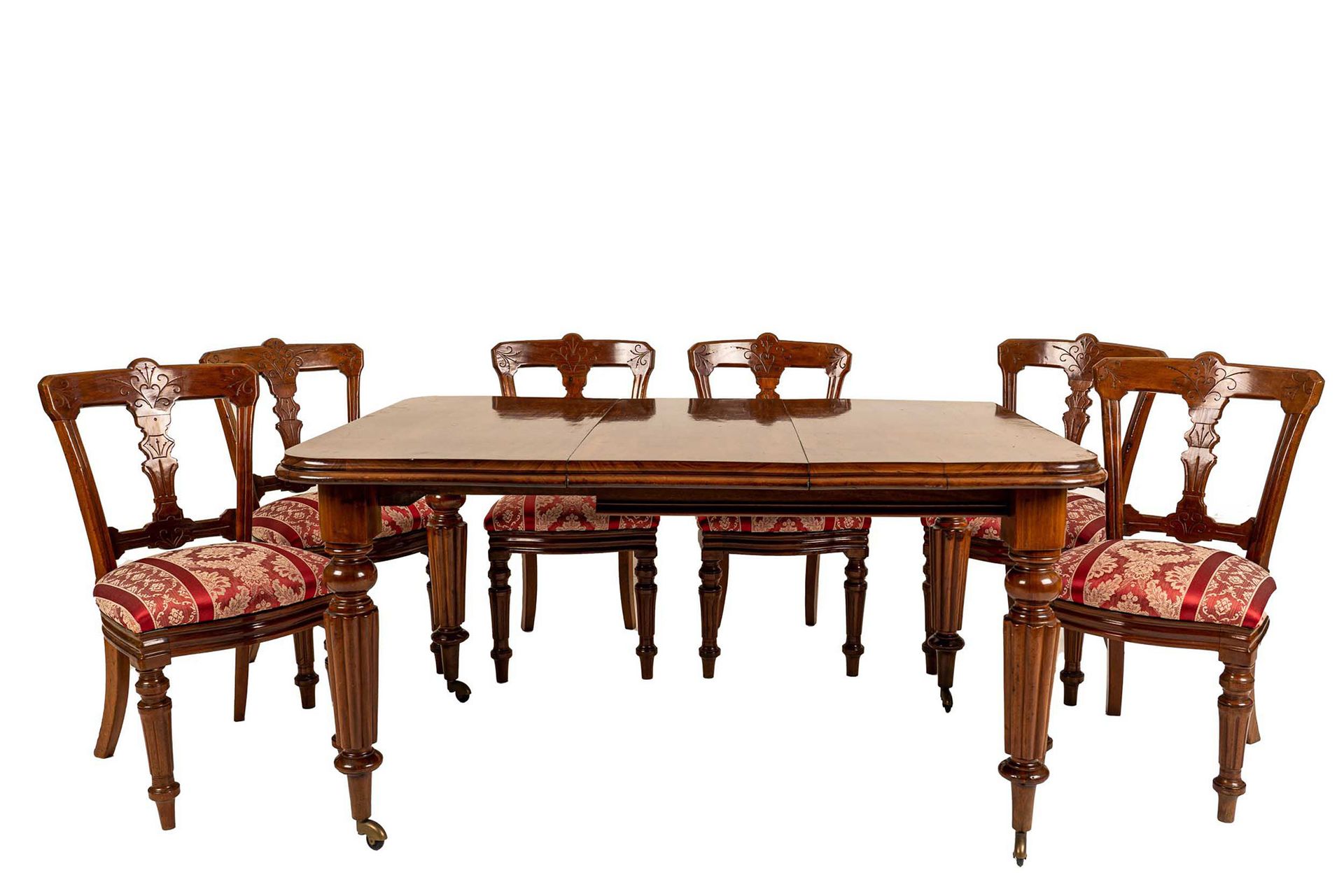 Null 可扩展的餐桌和六把椅子

英国 20世纪初

桌子，长方形桌面，转弯和凹槽腿，配有一个延长线；胡桃木椅子，形状靠背，座椅覆盖红色棉花，转弯腿

带扩展&hellip;