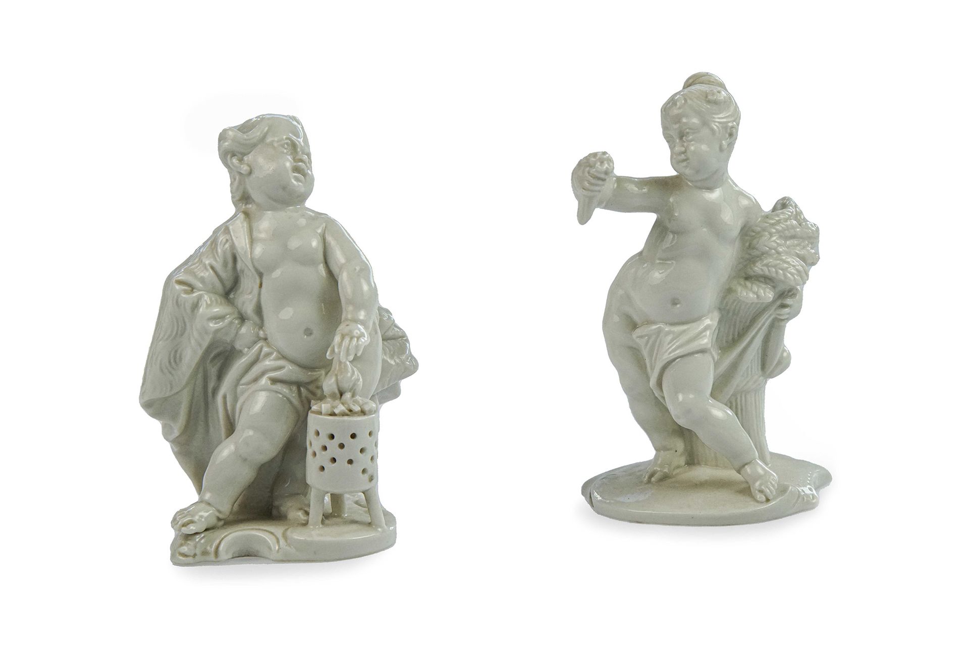 Null Pair of putti 

in white porcelain 

h 11 cm