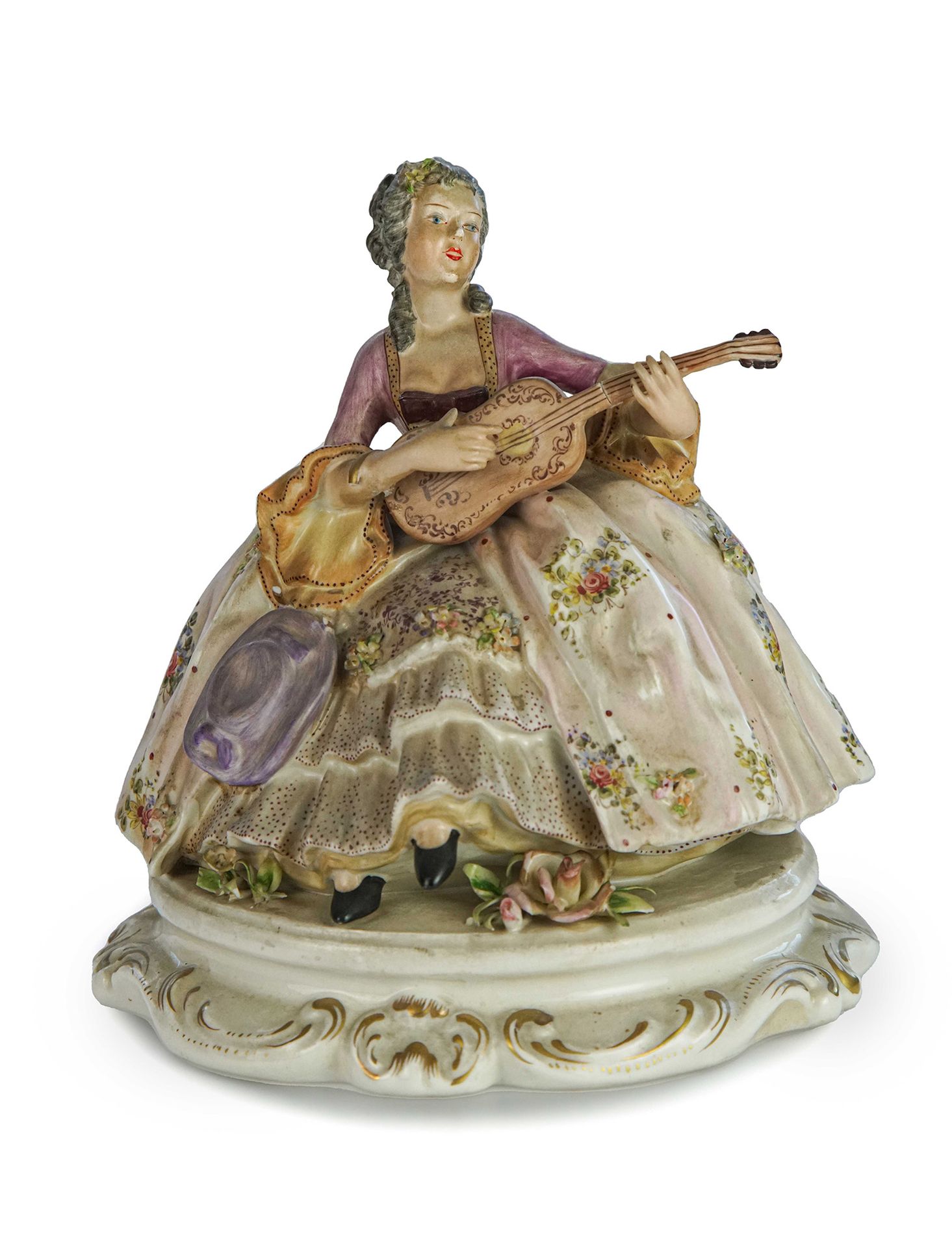 Null Statuette depicting a lady playing a guitar 

in polychrome porcelain Capod&hellip;