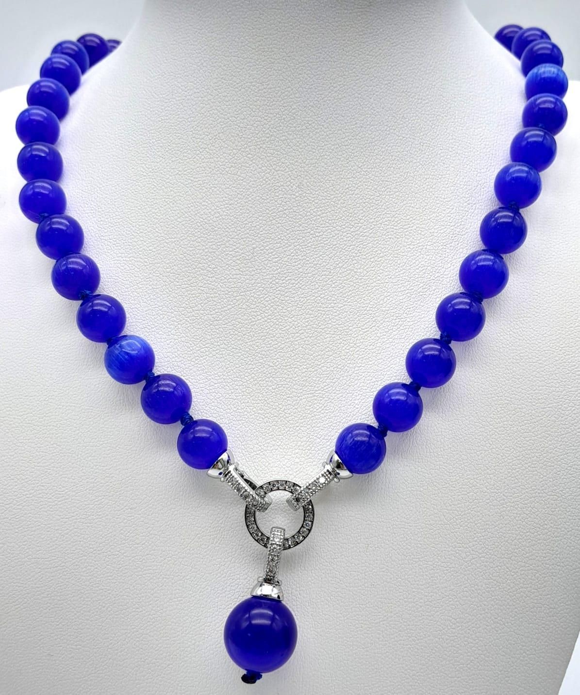 Null Collier de perles en œil de chat bleu avec pendentif suspendu. Perles de 10&hellip;