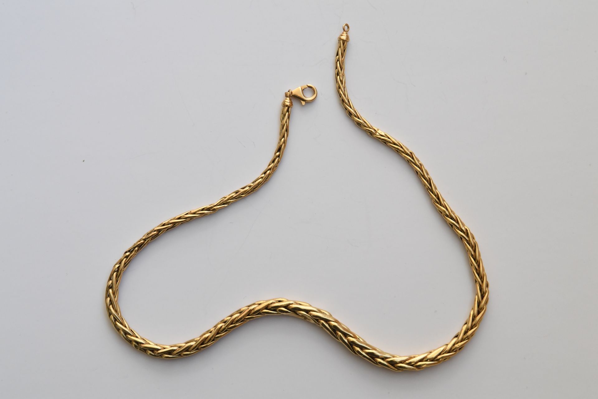 Null Halskette aus 750° Gold mit Palmennetz. Bruttogewicht: 17,4 Gramm.