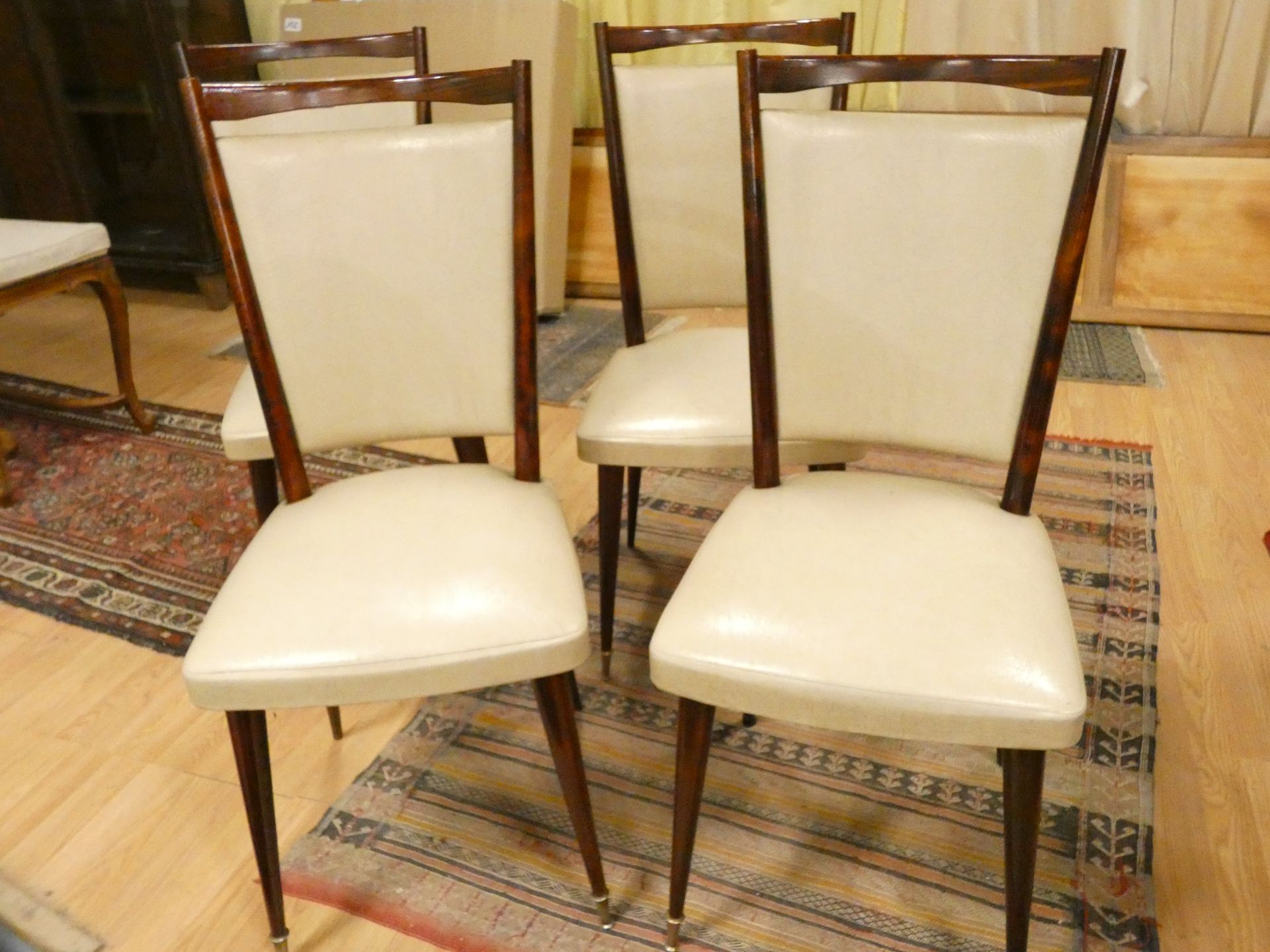 Null 
4 CHAIRS SEATS BAUMANN 50'S WOOD VARNISHED AND SKAI