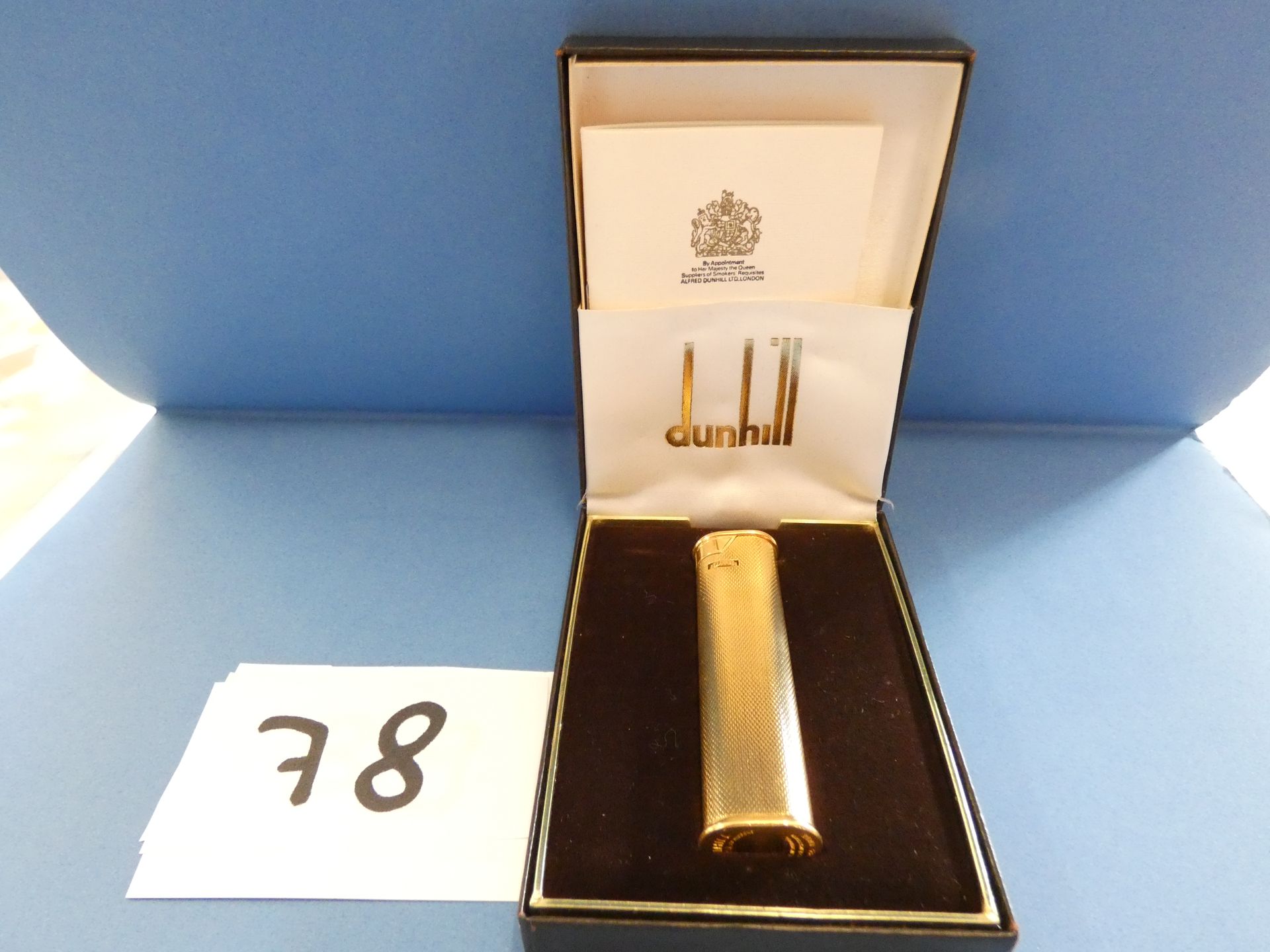 Null 
1 ACCENDINO DUNHILL GOLD PLATE