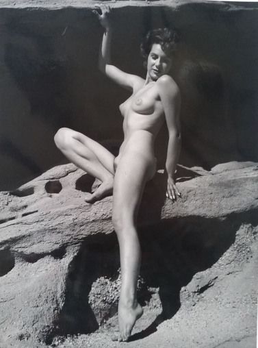 André de DIENES André de Dienes

 Nude seated on rock, 1960

 

Unique photograp&hellip;