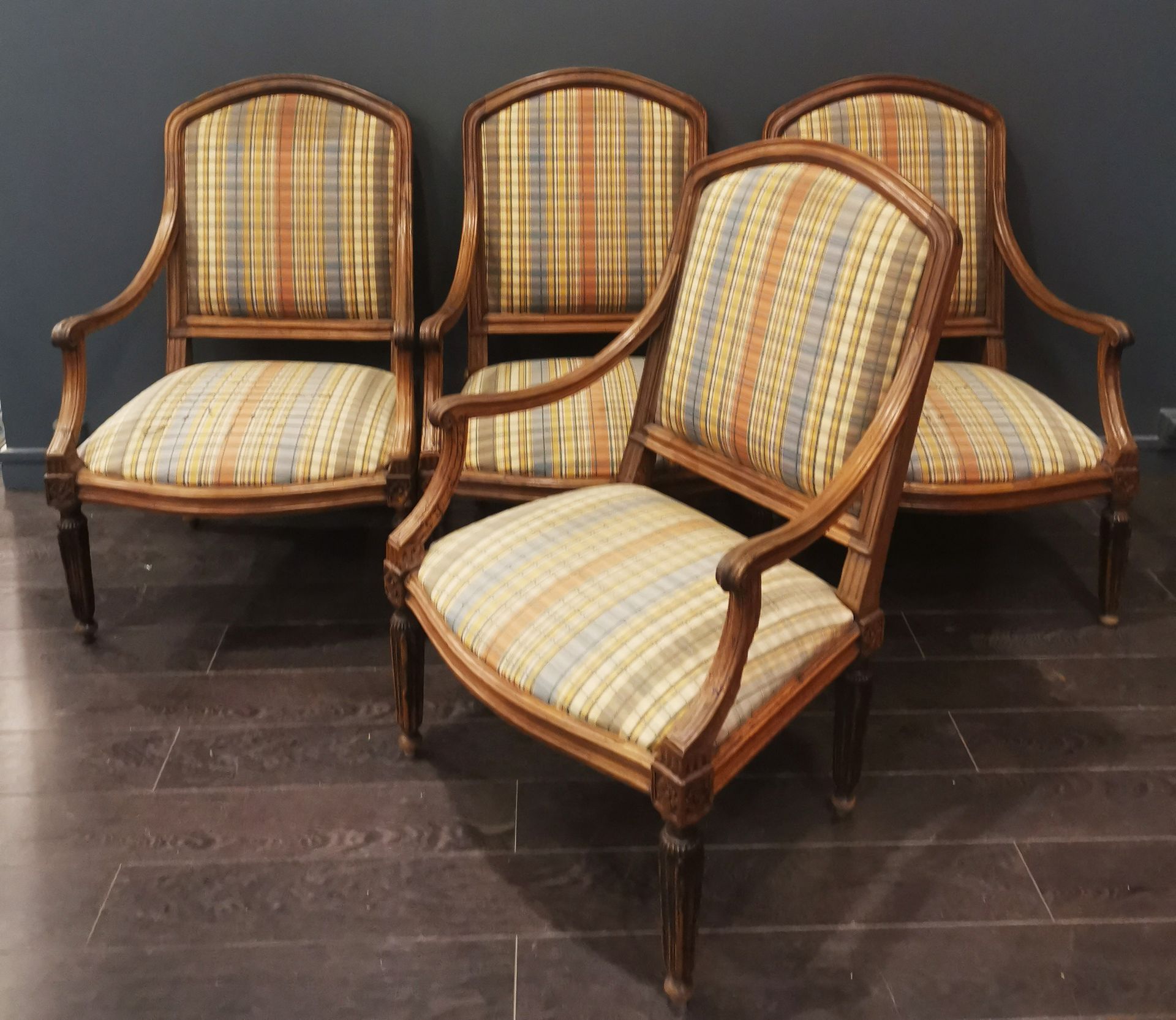 Null Suite of four armchairs, Louis XVI, tapered legs with grooves. Removable se&hellip;