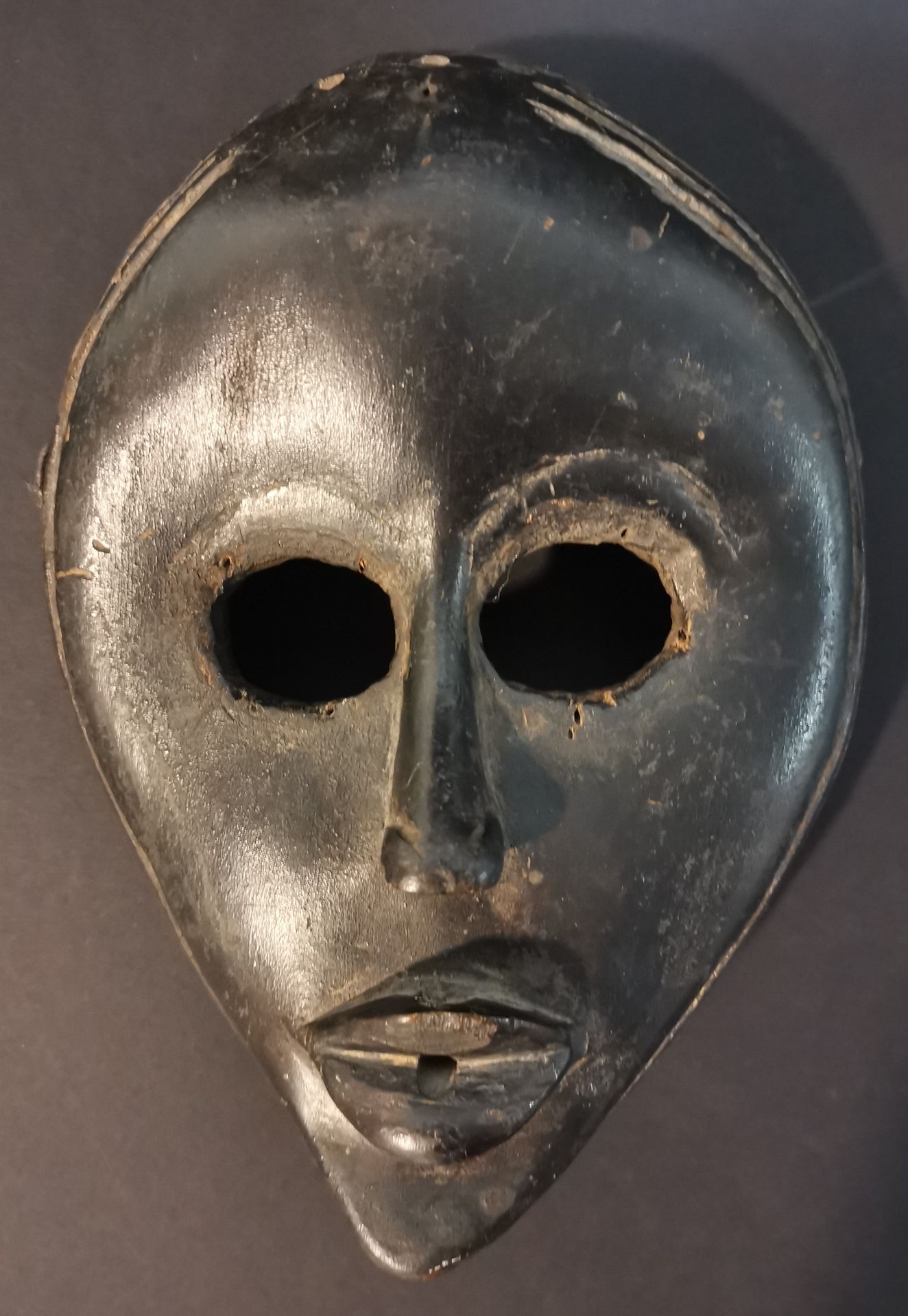 Null IVORY COAST - DAN. Mask. Very nice black patina of use. On the back of the &hellip;