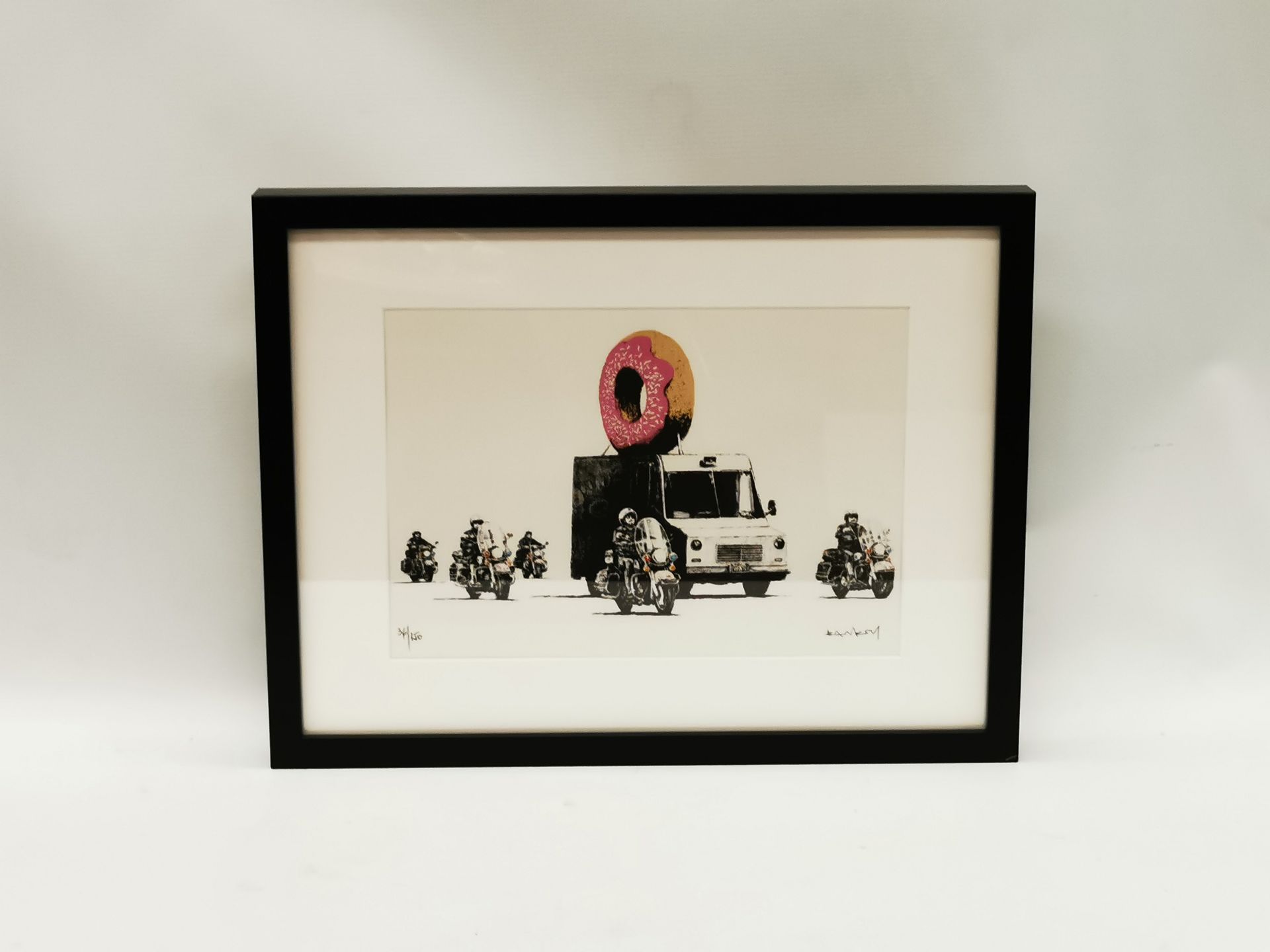 Null BANKSY (born 1974), after. Donuts. Color print on paper. Signed (in the pla&hellip;