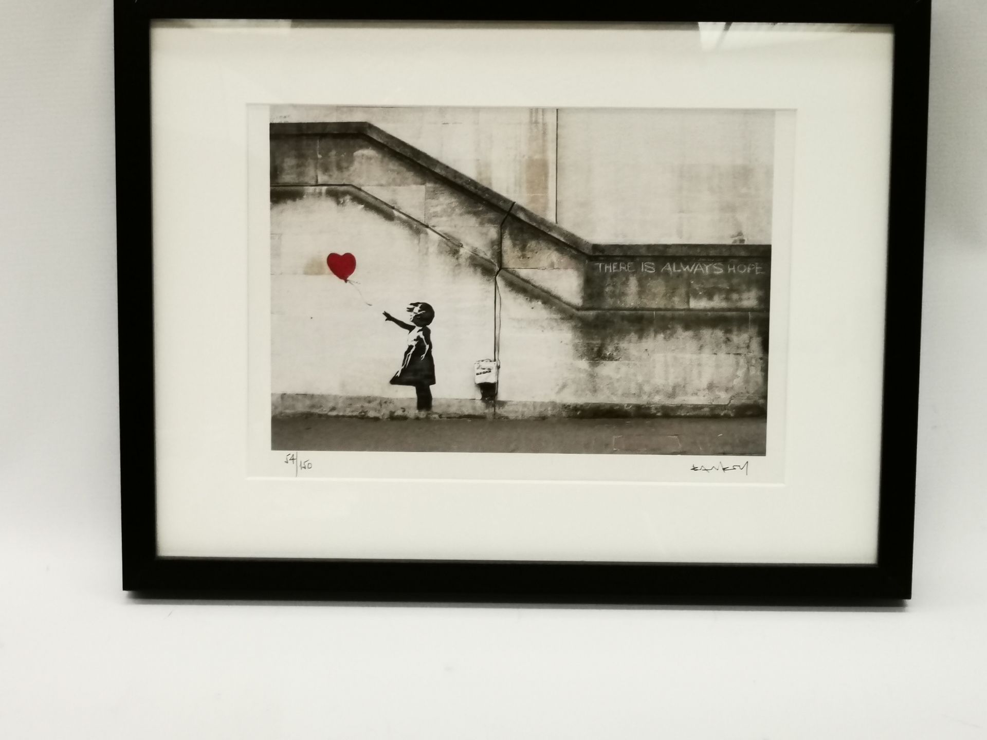 Null BANKSY (b. 1974), after. Girl with balloon 2014. Color print on paper. Sign&hellip;