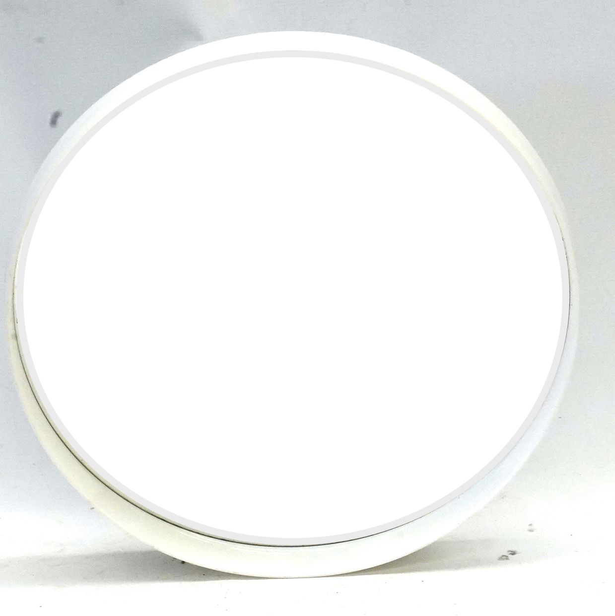 Null SYLA - Made in France. White PVC mirror model 710. D.47cm. Circa 1970.