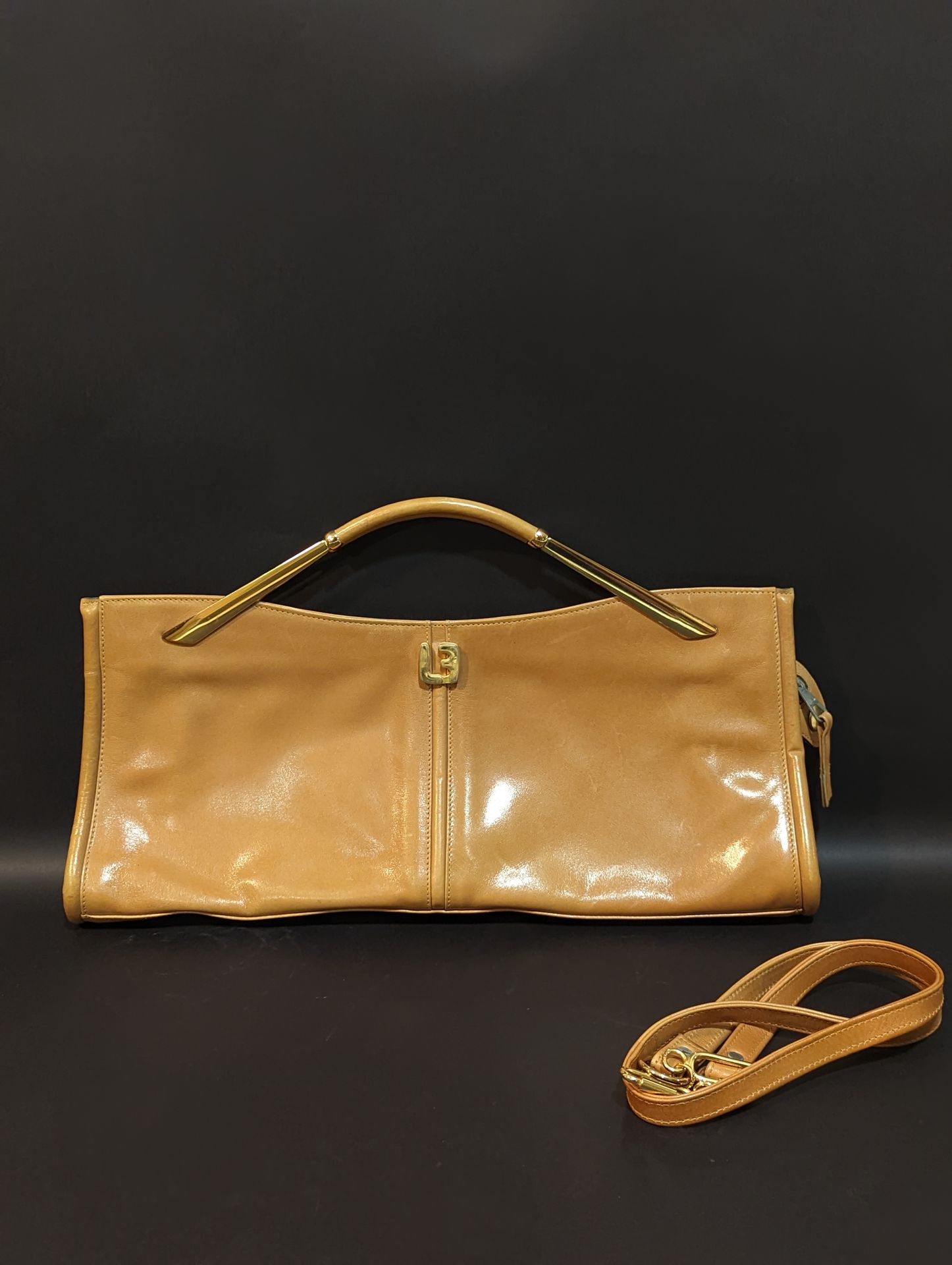 Null LOUIS FERRAUD. Cognac leather handbag with two handles and shoulder strap. &hellip;