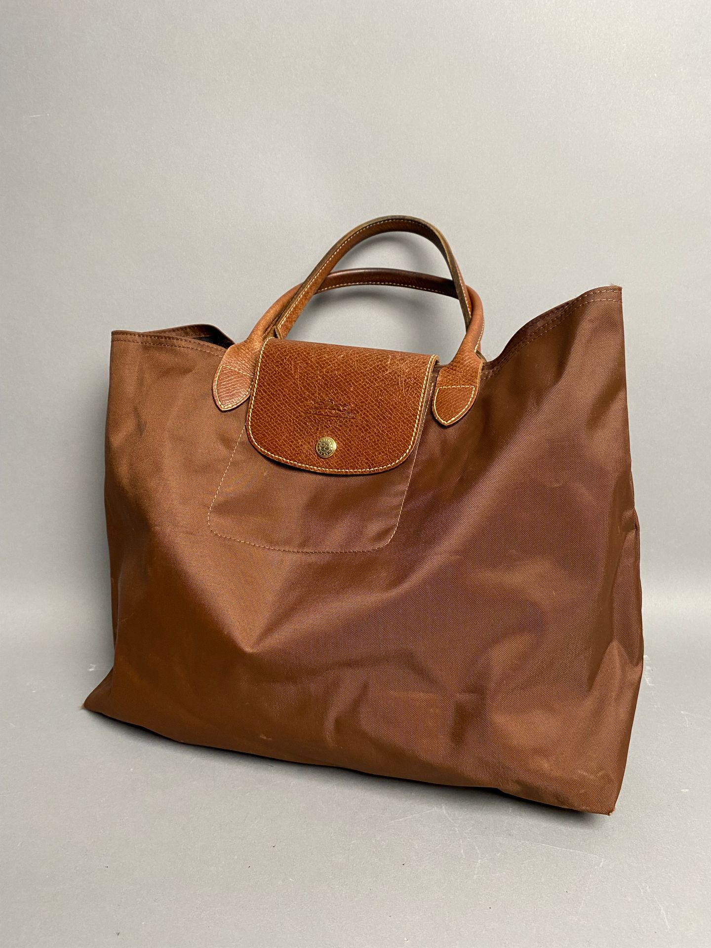LONGCHAMP. Brown nylon canvas and leather satchel bag, P…