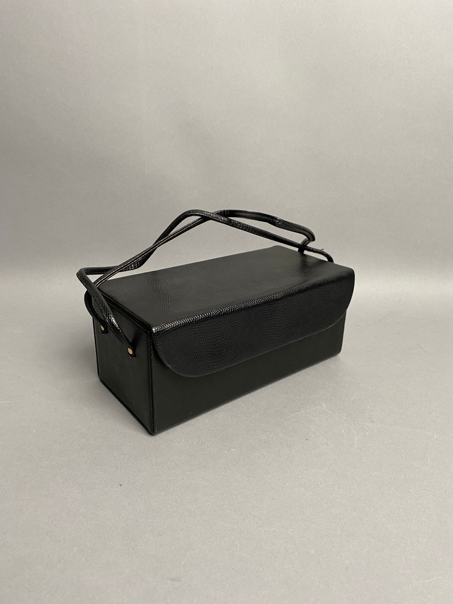 Jean-Louis SCHERRER. Black leather toilet bag of rectang…