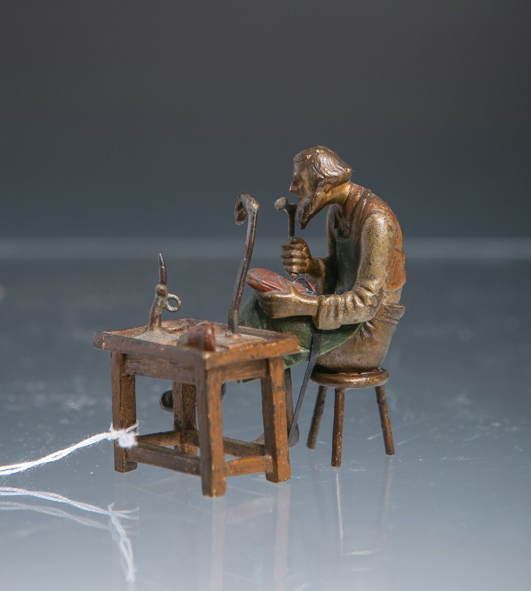 Null Unknown artist (20th c.), cobbler, small bronze figure, polychrome painted,&hellip;