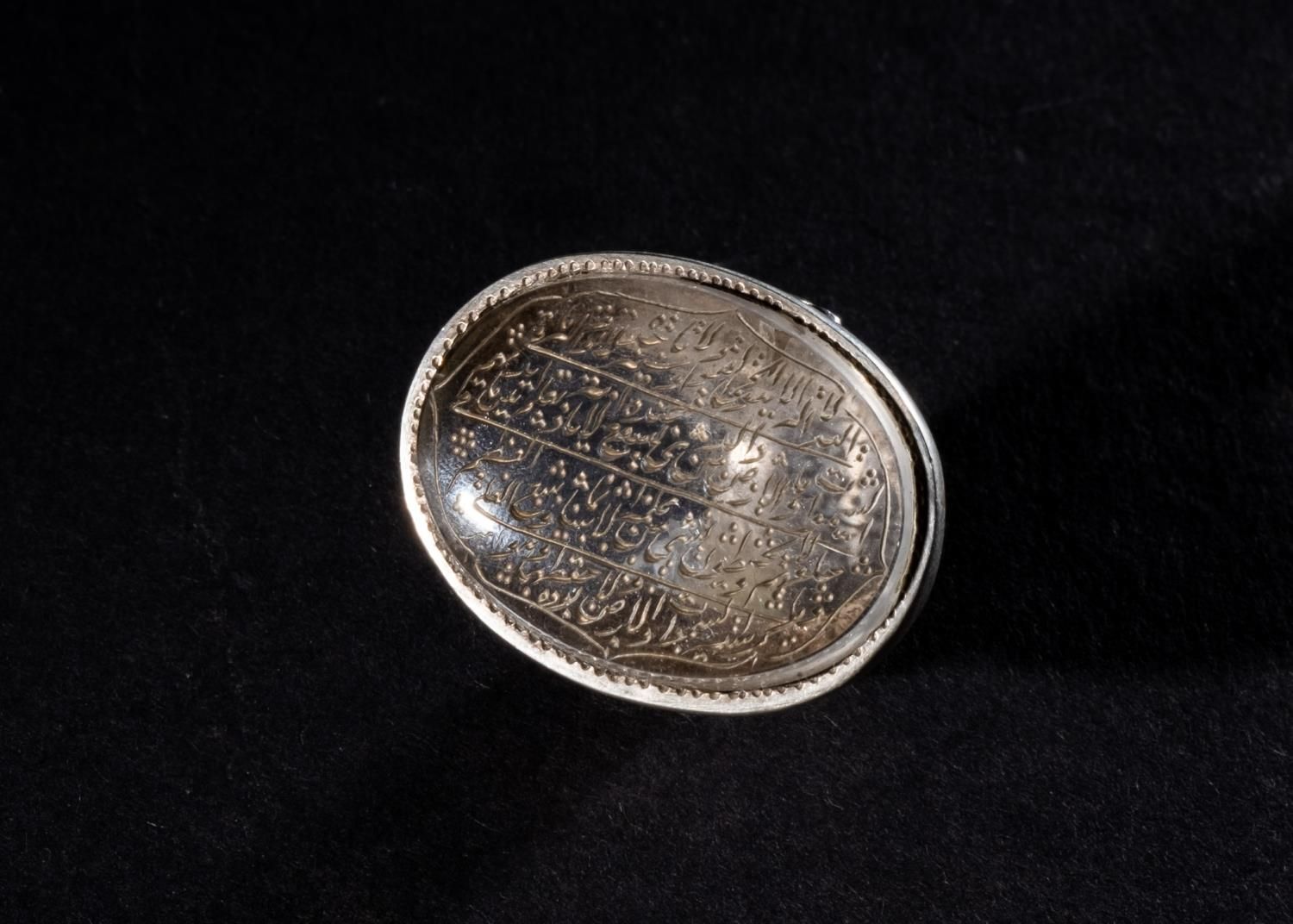 Null A CARVED ISLAMIC ROCK CRYSTAL CALLIGRAPHIC SEAL RING, SET ON SILVER 19TH CE&hellip;