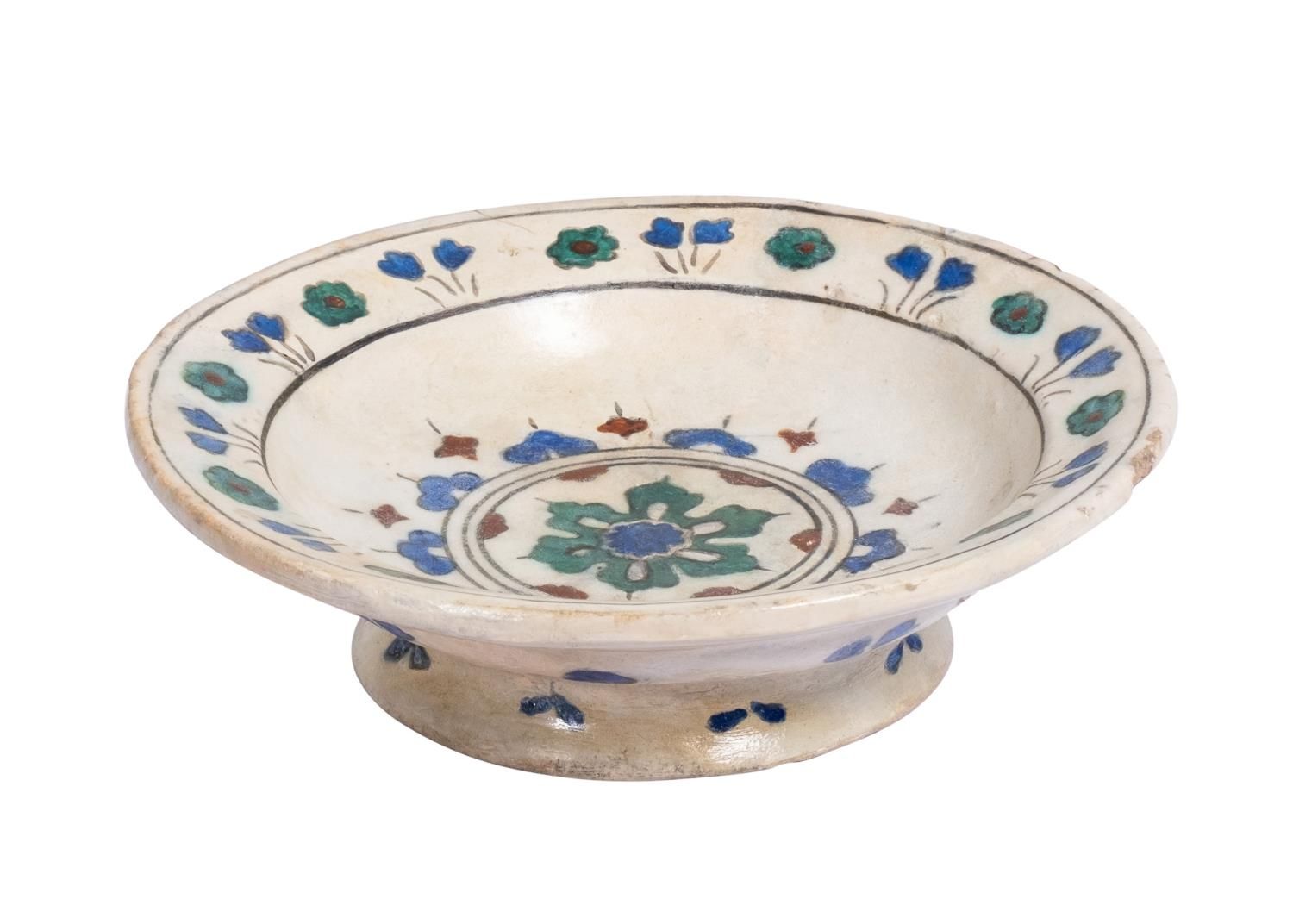 Null A EARLY FOOTED IZNIK FLORAL DISH, CIRCA 1520-1530, 16TH CENTURY
 
 Of round&hellip;