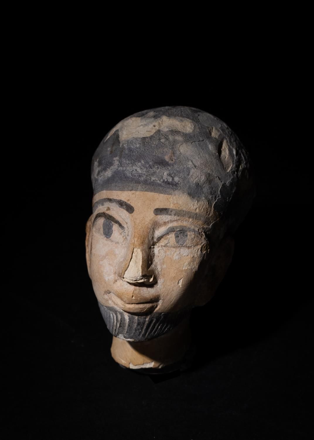 AN EGYPTIAN POLYCHROME LIMESTONE HEAD OF A DIGNITARY, NEW KINGDOM, 1550 – 1077 B&hellip;
