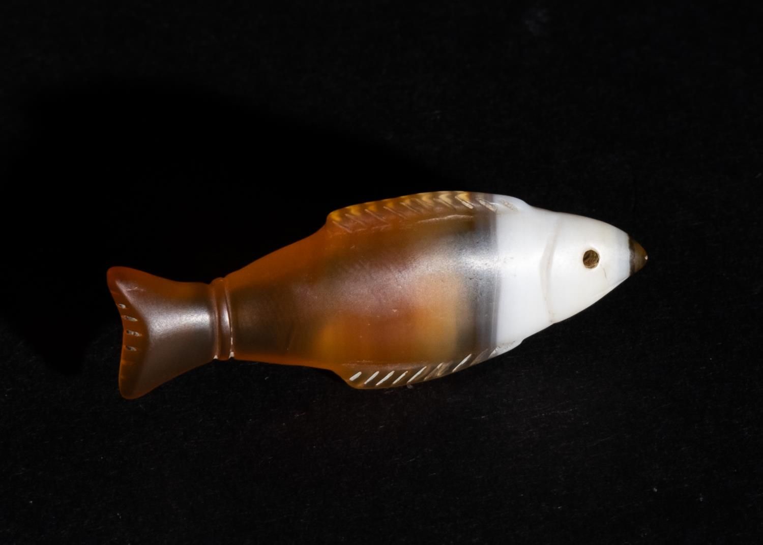 AN EGYPTIAN BANDED AGATE FISH AMULET, LATE PERIOD, CIRCA 664-332 B.C. AN EGYPTIA&hellip;