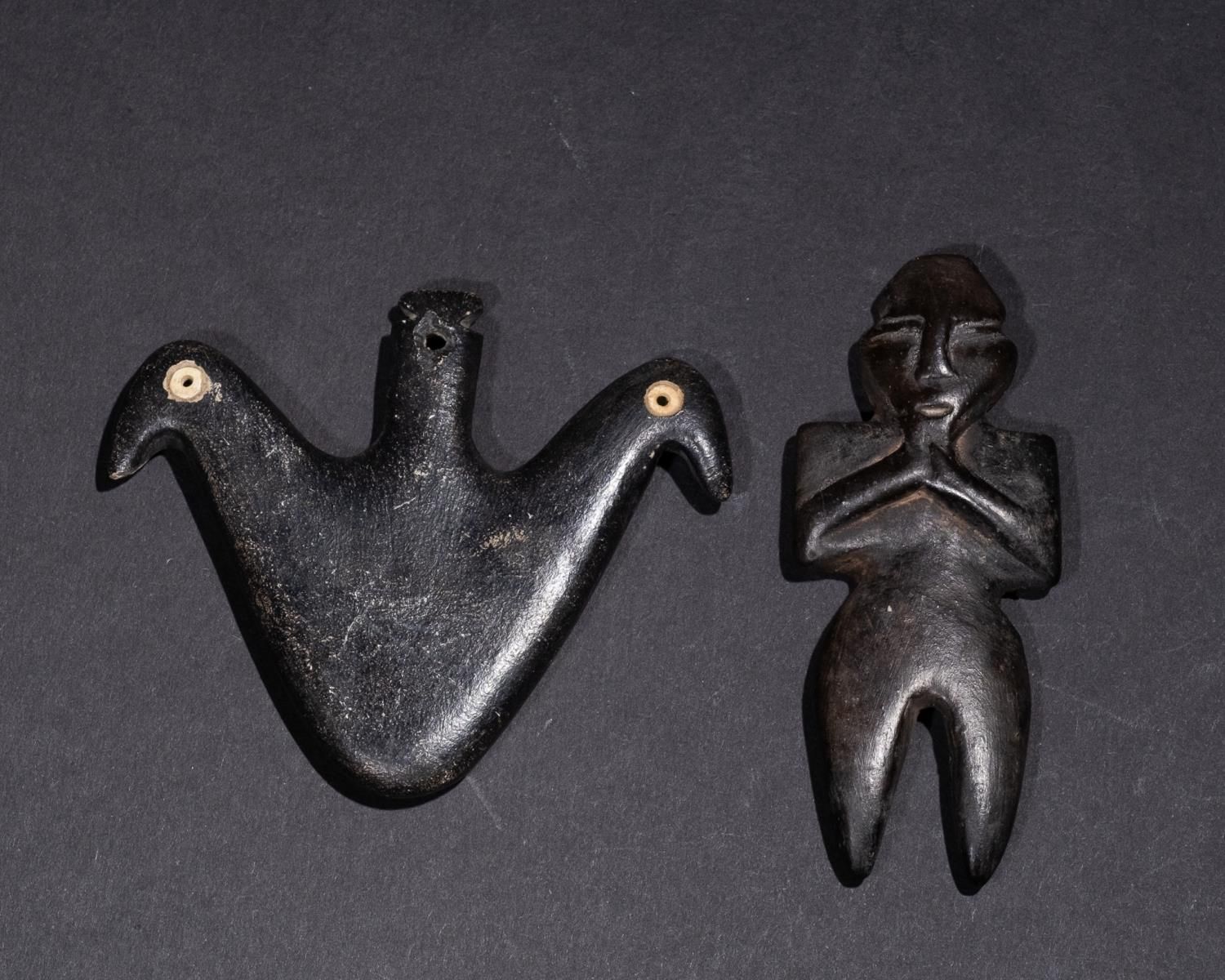 A ROMAN BONE BIRD PENDANT & A FIGURAL IDOL PENDANT, 2ND CENTURY A.D. OR LATER A &hellip;