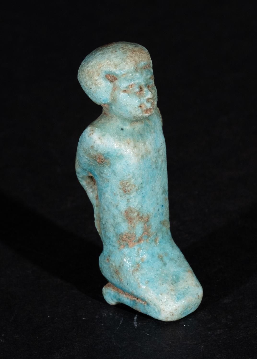 AN EGYPTIAN FAIENCE AMULET OF A PRISONER, PTOLEMAIC PERIOD CIRCA 664- 30 B.C. AM&hellip;