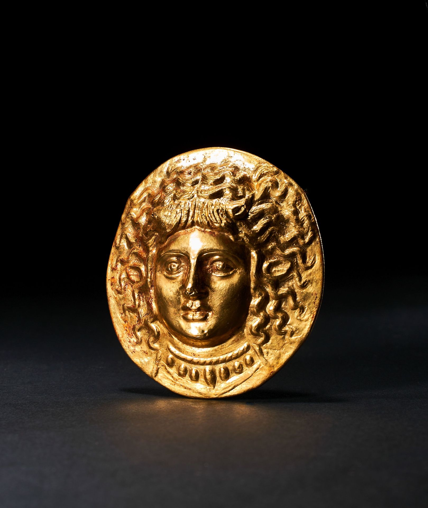 A HELLENISTIC GOLD APPLIQUE OF HERA, HELLENISTIC PERIOD, CIRCA 3RD CENTURY B.C. &hellip;