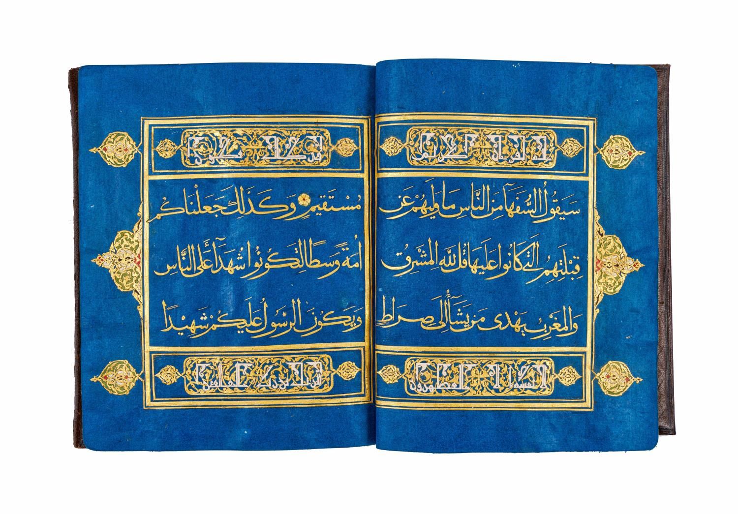 A BLUE QURAN SECTION WITH GOLD CALLIGRAPHY, 19TH/20TH CENTURY 带金色书法的蓝色《古兰经》断面，19&hellip;
