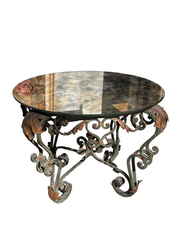 Null Wrought iron circular coffee table with green patina, mirror top.
1940's