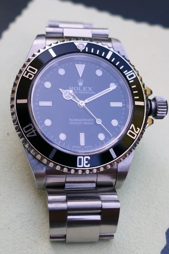 Null Rolex Submariner Uhr Referenz 16060 Modell "no date two lines". 
Mit seiner&hellip;
