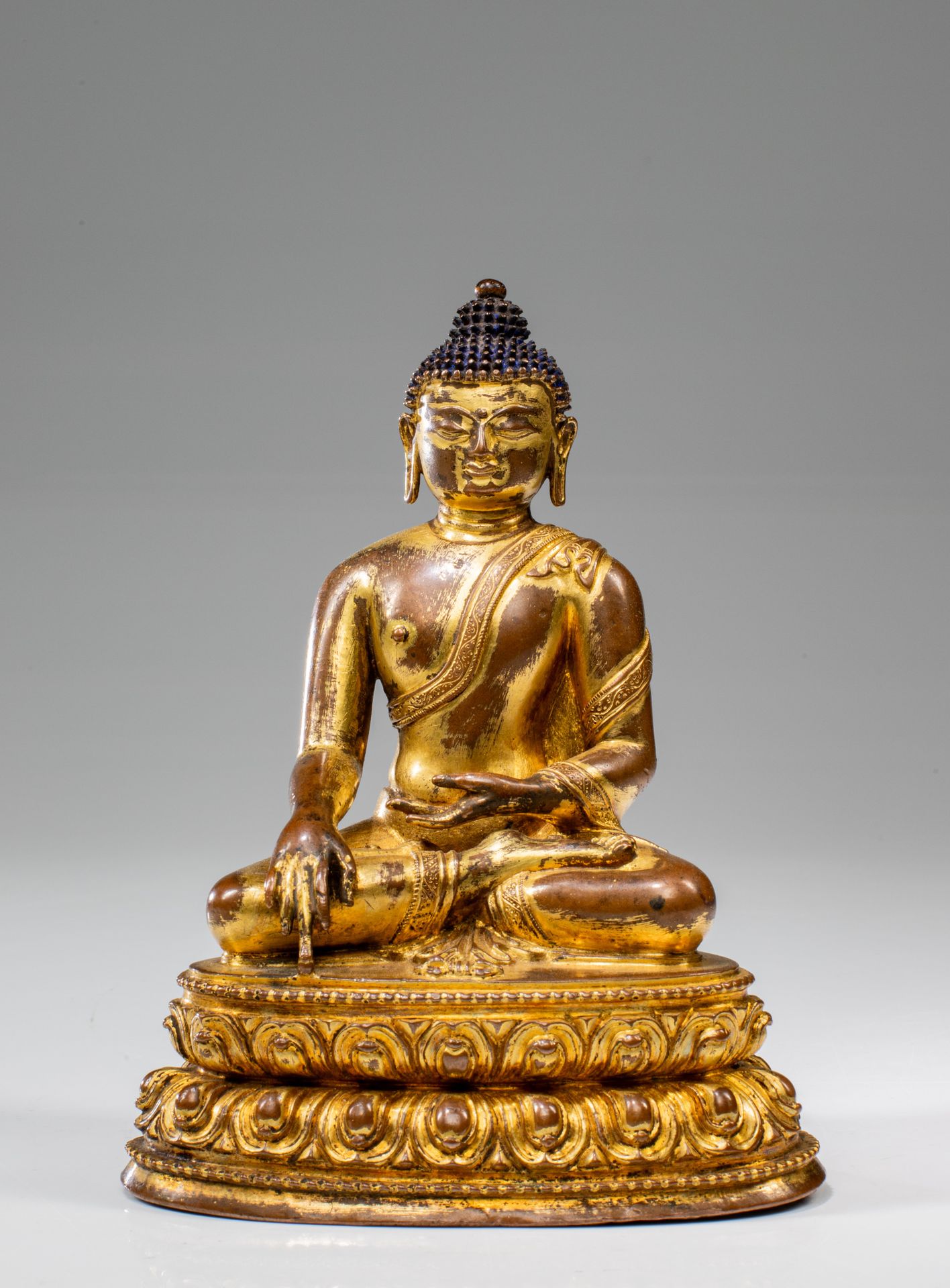 SEATED BUDDHA Bronze Tibet , 14th century Dimensions: Height 14 cm Wide 11 cm De&hellip;