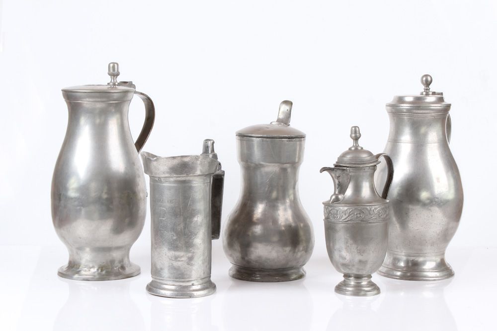 Null Five jugs. German, 19th century Pewter. Three pear jugs, a small jug and a &hellip;
