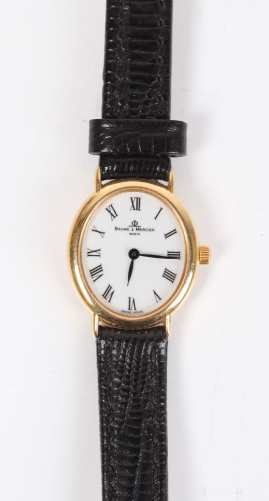 Null Ladies' wristwatch. GG 18 K. Baume & Mercier Switzerland. Oval gold case, w&hellip;