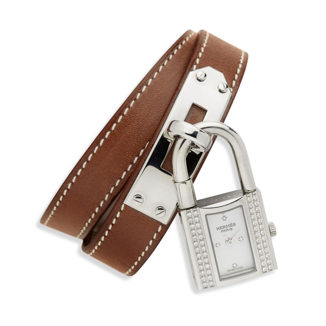HERMES Kelly" wristwatch in steel, the case set with four lines of small round b&hellip;