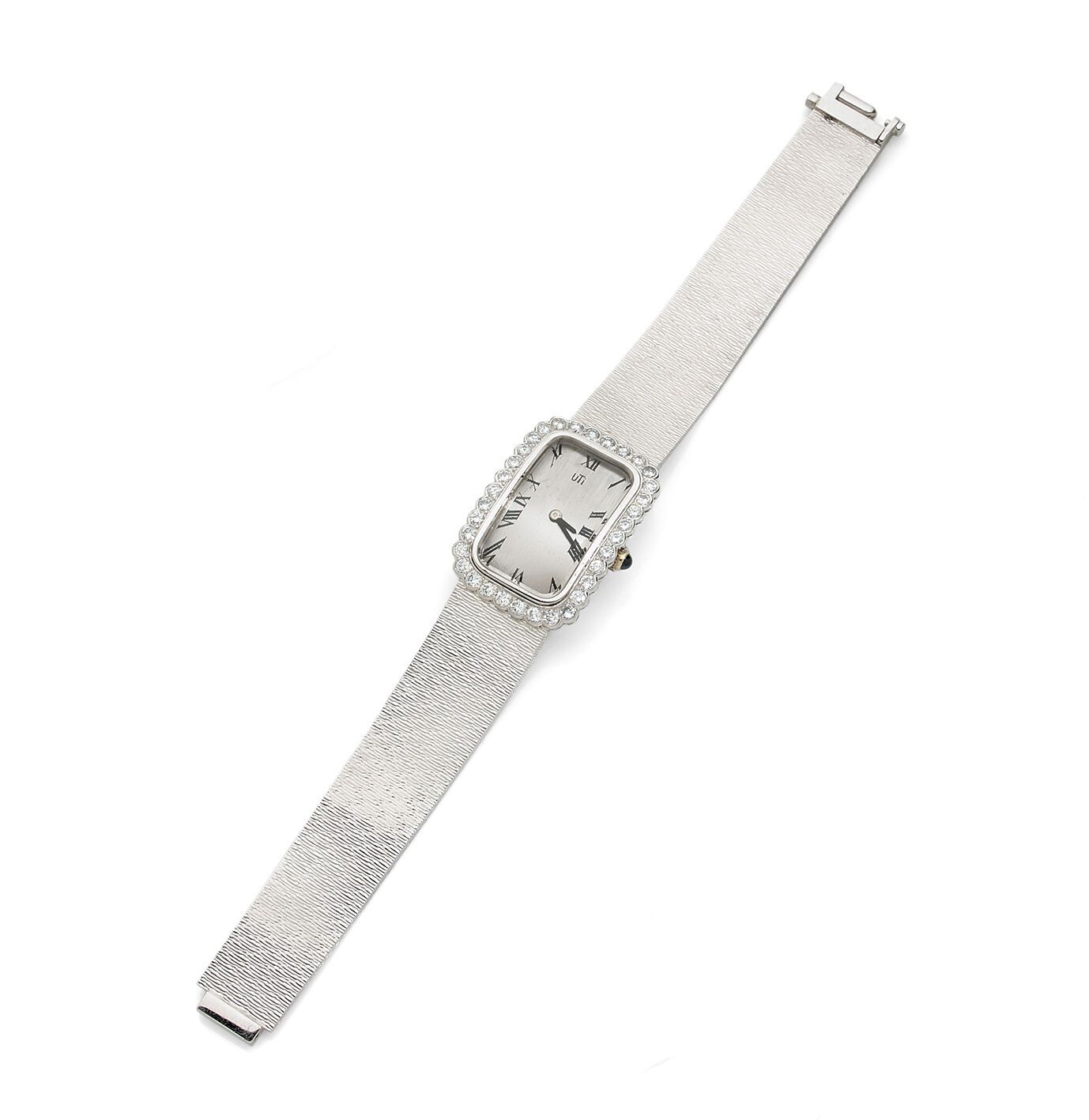 UTI UTI
Montre-bracelet de dame en or gris 18K, circa 1970, cadran oblong agréme&hellip;