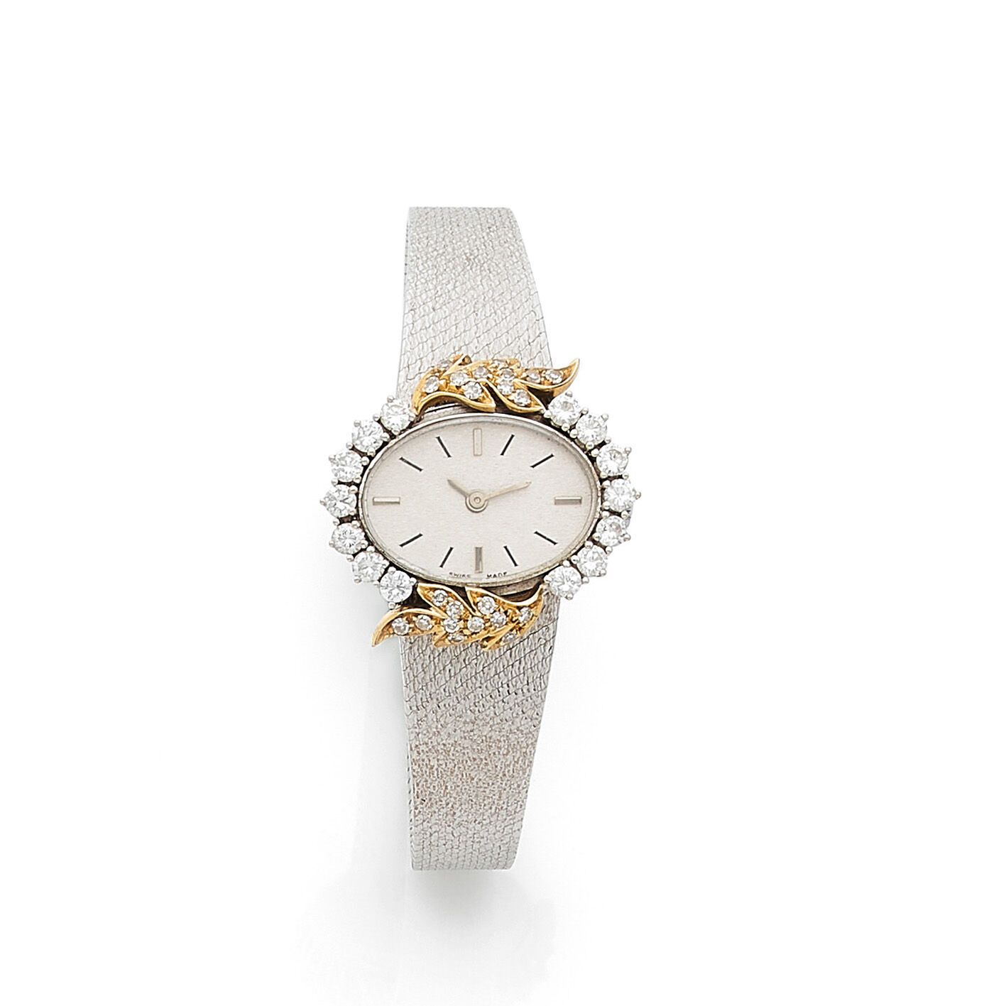 TRAVAILSUISSE DES ANNÉES 1960 1960年代的瑞士作品
18K（千分之七十五）白金女装腕表，银色表盘，彩绘和涂抹式刻度，银色剑形指针&hellip;
